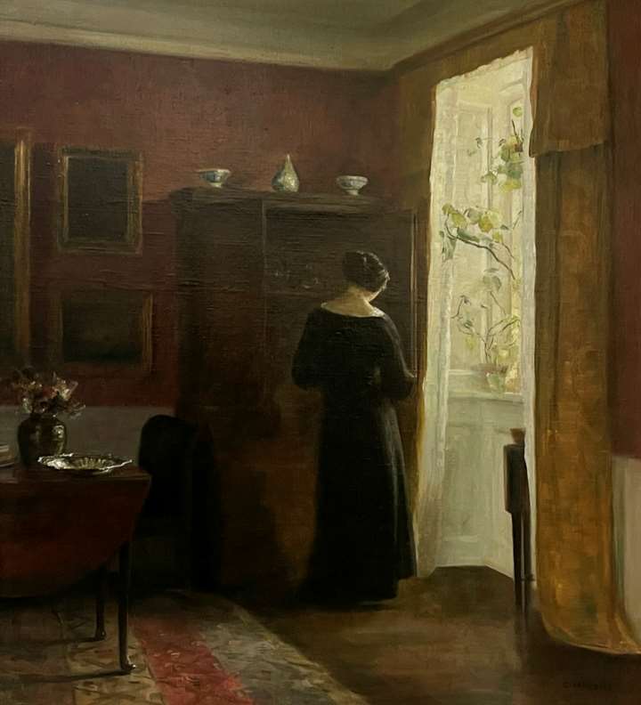Interior with woman by the window